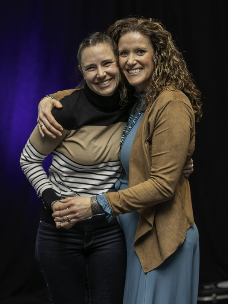 Community Service Award recipient Lara Kreuter hugs ACCT Executive Director Melissa Webb, who recognized Lara during the Awards Ceremony at the Awards Ceremony during the 2025 conference and exposition.