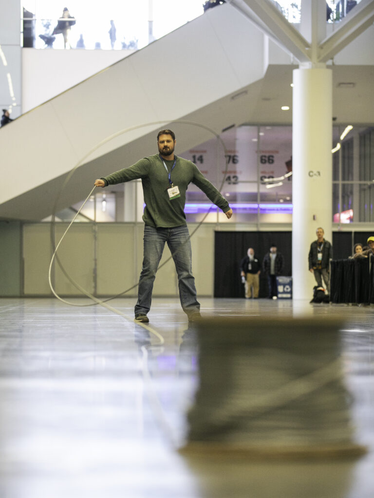 A man has just whipped galvanized steel aircraft cable during the Harnessing ACCT showdown hosted during the 2025 conference and exposition.